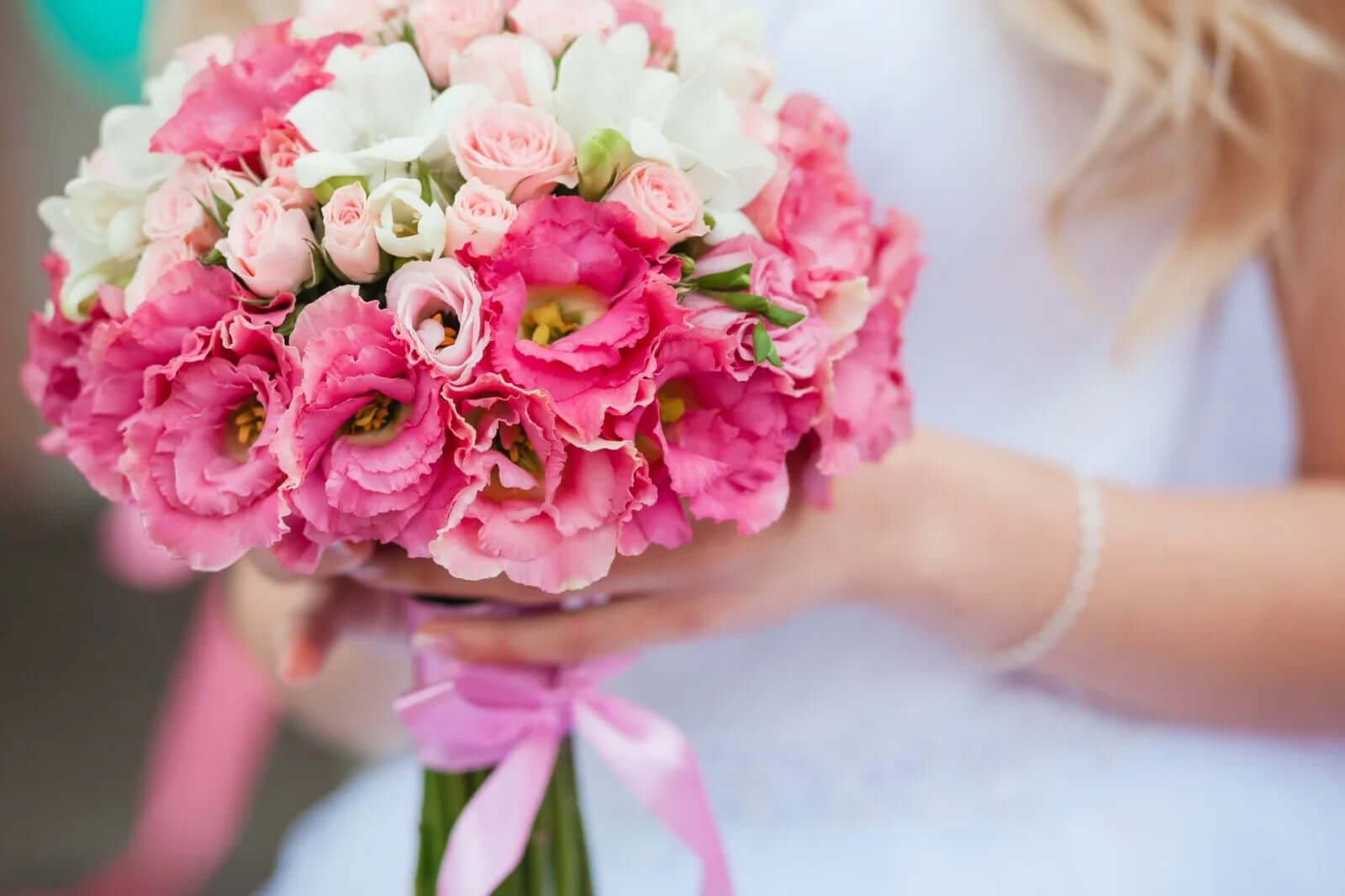A vibrant Occasion Bouquet featuring pink and white flowers, perfect for weddings and celebrations.