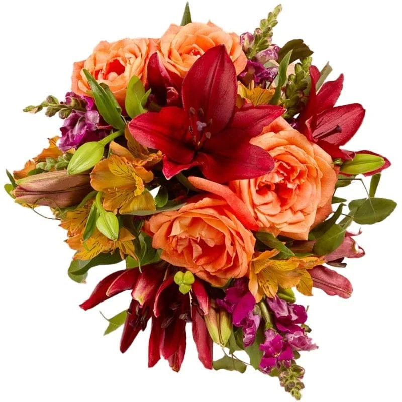 Ein bunter Blumenstrauß mit Rosen und Lilien.