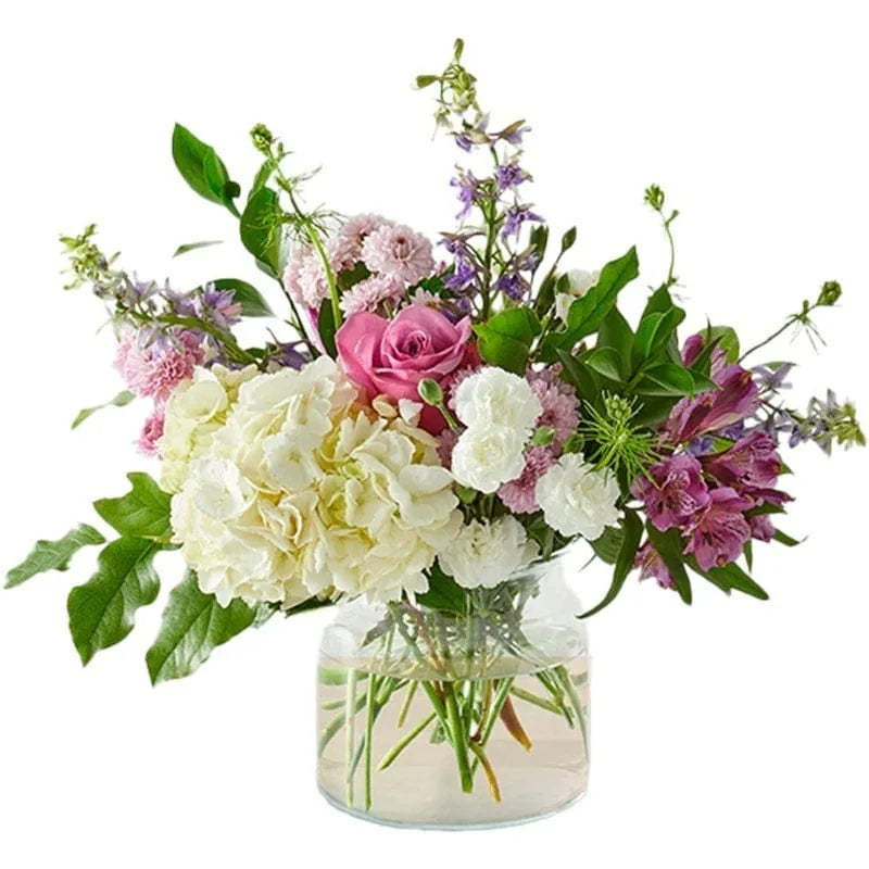 Bunter Blumenstrauß mit verschiedenen Blumen in einer Vase